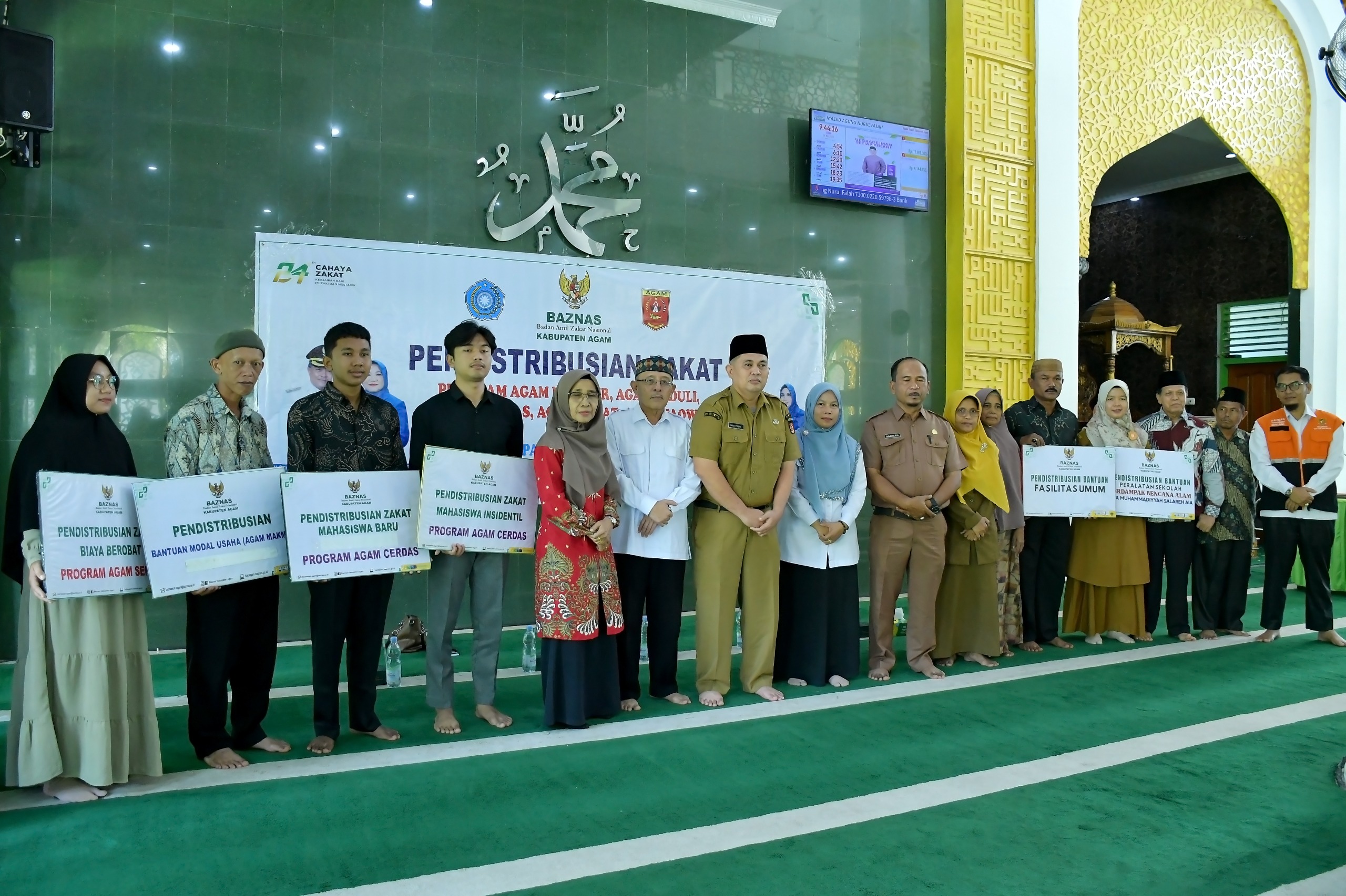 baznas-agam-salurkan-zakat-rp410-juta-kepada-151-mustahik