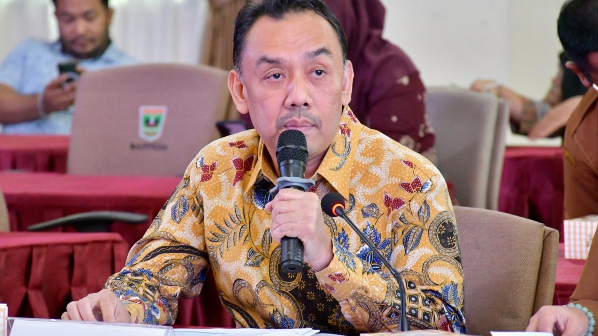 Wabup Agam, Muhammad Iqbal, memaparkan strategi penguatan keterbukaan informasi publik di Aula Bappeda Sumatera Barat.